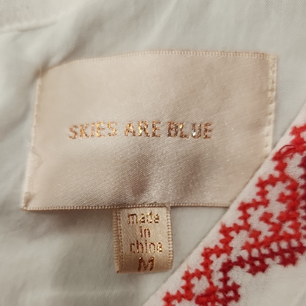 Skies Are Blue Cream Romper with Red Accents - Picture 2 of 10